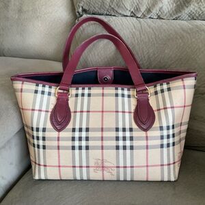 Authentic Burberry with burgundy straps